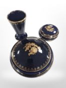 A Limoges porcelain circular lidded dressing table pot, diameter 13.5cm, a further pot and a beaker.
