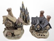 Two large David Winter cottage ornaments and a further depicting a Castle,