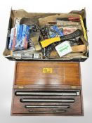 A group of hand tools and hardware,