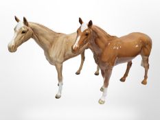 Two large Beswick palomino horses, height 29cm.