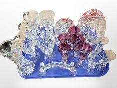 A group of crystal wine glasses, West German crystal vases, Sydney Harbour Bridge paperweight, etc.