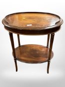 A reproduction mahogany oval occasional table,