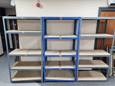 Three sets of adjustable metal racking,