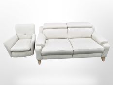 A Parker Knoll three seater settee and matching armchair in oatmeal fabric,