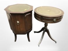 A reproduction mahogany drum table and an octagonal drink's cabinet,