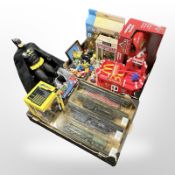 A group of scale model locomotives, Britains 1:32 scale JCB, The Simpsons figurines,