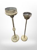 Two brass smoker's stands, tallest 73cm.