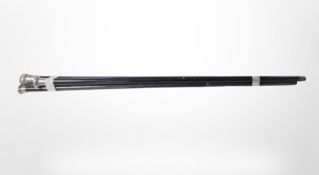 Three antique ebonised walking canes with silver pommels.
