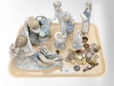 A group of six Lladro figures, together with antique and later coins, marcasite watch.