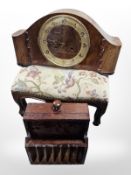 An Art Deco walnut mantle clock, a small foot stool and a further box.