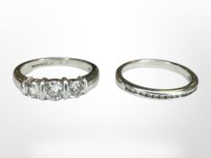 A platinum three-stone brilliant-cut diamond ring, size K/L, 5.