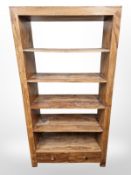 A mango wood open bookcase,