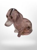 A Czechoslovakian amethyst glass figure of a Dachshund, with faceted glass eyes, circa 1930s,