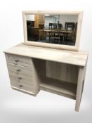 A modern pine effect mirror backed dressing table,