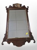 A Chippendale style mirror,