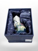 Eighteen matching Old Tupton Ware pottery figures of seated cats, height 15cm, all boxed.