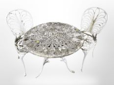 A painted cast aluminium circular garden table, diameter 81 cm,