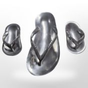 Three stainless steel serving dishes in the form of sandals, longest 28 cm.