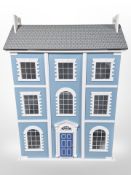 A Georgian style three storey doll's house,