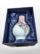 Sixteen matching Old Tupton Ware floral pottery vases, height 15cm, all boxed.