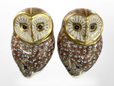 A pair of Royal Crown Derby owl paperweights, with silver stoppers, height 11cm.