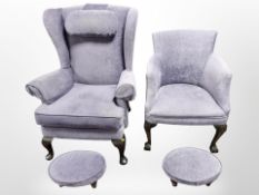 A wing back armchair and similar lady's chair in purple upholstery and two small footstools