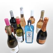 Ten various bottles of alcohol, including California Rose, Bombay Sapphire gin, Chardonnay,