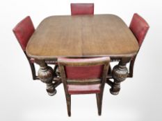 An oak extending dining table, on carved bulbous legs and X-framed under stretcher,