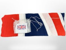 A Ministry of Defence quality woven polyester Union Jack flag, with rope and toggle, 18 ft x 9 ft.