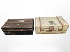 An antique canvas bound trunk plus one other with metal mounts,