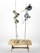 A shaped pine low bench and two standard lamps.