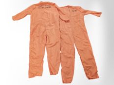 Two reproduction prison jumpsuits.
