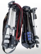 A Slik folding adjustable camera tripod, a Hahnel tripod, both with soft carry bags,