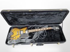 An Epiphone SG electric guitar with attached Roland GK-3 pickup, in hard carry case.