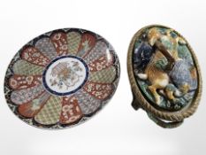 A late 19th century Japanese imari porcelain charger, diameter 39 cm, and a Majolica game tureen.