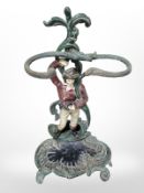 A painted cast iron figural umbrella stand, height 58 cm.