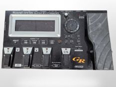 A Roland GR-55 guitar synthesizer.