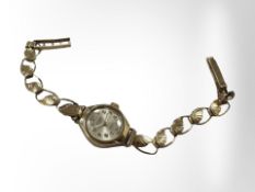 A lady's 9ct gold Excalibur wristwatch on 9ct bracelet.