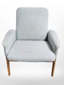 A 20th century Danish armchair by Navritil, in pale blue upholstery, width 78 cm.
