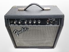 A Fender Frontman 15G amplifier.