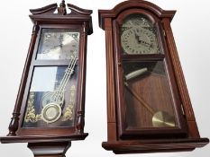 An Emperor quartz westminster chime wall clock and a similar president clock, length 70 cm.