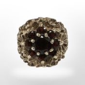 A 9ct gold garnet cluster ring, size K. CONDITION REPORT: 4.3g.