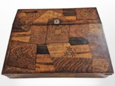 A late Victorian parquetry writing slope with Japanned interior,