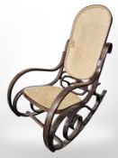 A bentwood bergere rocking chair.