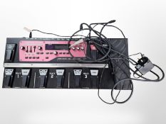 A Boss RC-300 loop station with leads.