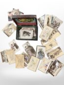 A Victorian box containing postcards, First World War silks etc.