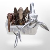 A silvered metal stag's head (af), heavily carved trinket box, model elephant and a further carving.