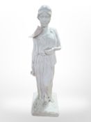 A resin statue of a Greek woman,