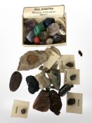 A collection of polished gemstones including amethyst, malachite, lapis lazuli,