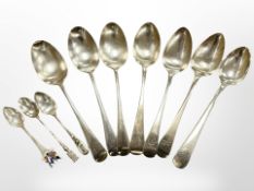 Seven various George III and later table spoons and three silver teaspoons, one enamelled.